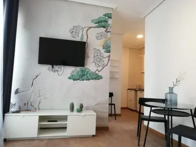 Una televisión o centro de entretenimiento en Smartr Madrid Gran Via 47
