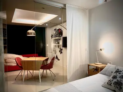 Cama o camas de una habitación en CAMILA, en CHUECA