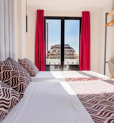 Cama o camas de una habitación en Hostal Juliette-Gran Vía
