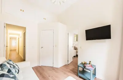 Una televisión o centro de entretenimiento en Apartamento en Puerta del Sol