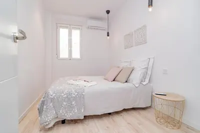 Cama o camas de una habitación en Espléndido y Radiante Apto en Malasaña By Batuecas