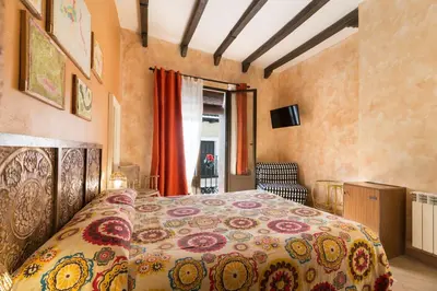 Cama o camas de una habitación en Hostal Artistic B&B