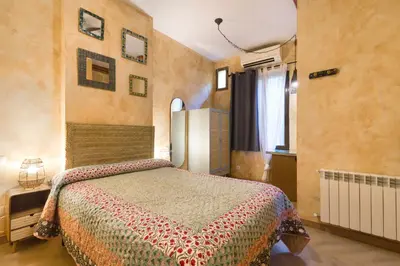 Cama o camas de una habitación en Hostal Artistic B&B