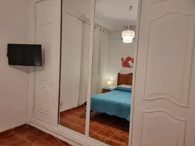 Cama o camas de una habitación en Casa de Huéspedes Cuenca