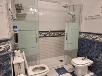 Un baño de Casa de Huéspedes Cuenca
