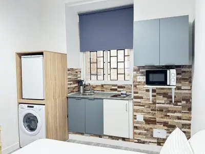 Una cocina o zona de cocina en Apartamentos Day Madrid MALASAÑA I