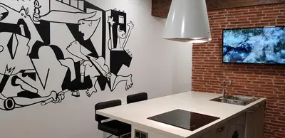 Una televisión o centro de entretenimiento en PICASSO CALLAO WiFi FREE - TEMPORADA RENTAL Workers & Stud