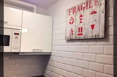 Una cocina o zona de cocina en Pop Girl CALLAO 5 WIFI FREE Temporada RENTAL Workers y Est