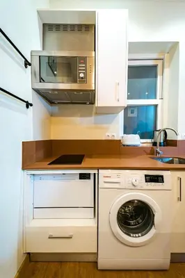 Una cocina o zona de cocina en Acogedor estudio en Cuatro Caminos by beBalmy