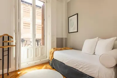 Cama o camas de una habitación en Madrid 1915 Private Suites