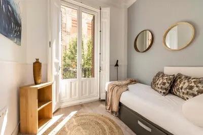 Cama o camas de una habitación en Madrid 1915 Private Suites