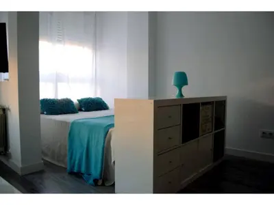 Cama o camas de una habitación en Blue Loft Atocha