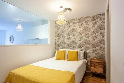 Cama o camas de una habitación en Heima Gran Vía B