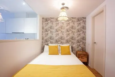 Cama o camas de una habitación en Heima Gran Vía B