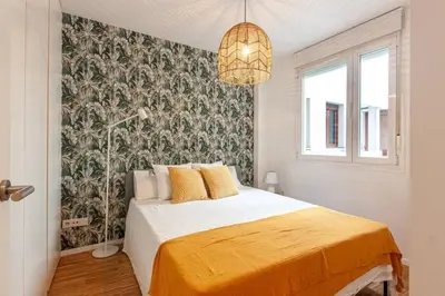 Cama o camas de una habitación en Heima Gran Vía C