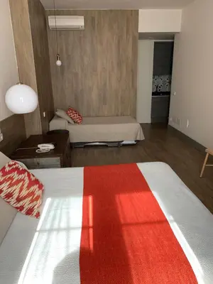Cama o camas de una habitación en LOFTS Puerta del SOL