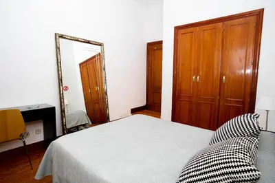 Cama o camas de una habitación en LOFTS Puerta del SOL