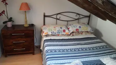 Cama o camas de una habitación en COZY ROMANTIC MALASAÑA