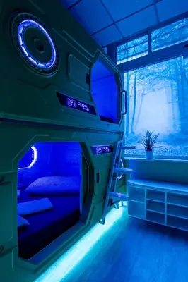 Cama o camas de una habitación en OXYGEN HOSTEL Capsula