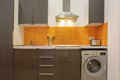 Una cocina o zona de cocina en Calle Huertas Coqueto by RegalateMadrid
