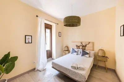 Cama o camas de una habitación en La Casa de Miguel Servet