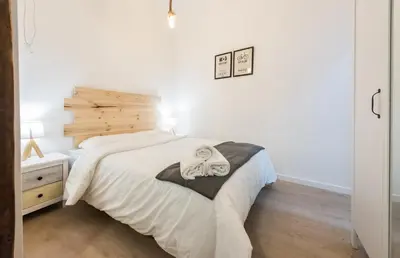 Cama o camas de una habitación en El Encanto de Malasaña