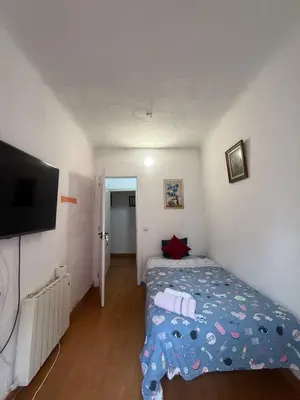 Cama o camas de una habitación en Bulevar habitaciones