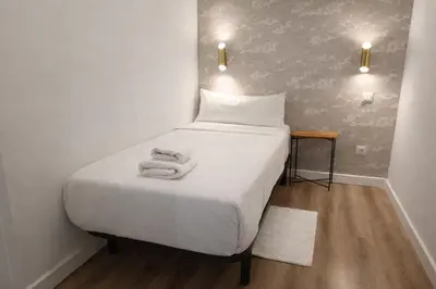 Cama o camas de una habitación en La Latina I - Descubre Madrid desde un Espacio con Estilo