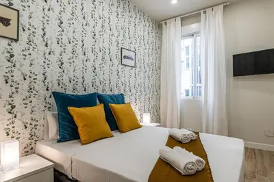 Cama o camas de una habitación en Waou Malasaña III - Alquiler Corta Duración