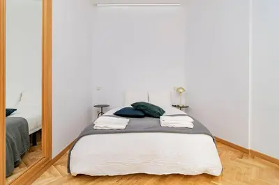 Cama o camas de una habitación en Espectacular Apto. Centro de Madrid C/Infantas 3-6 by Batuecas