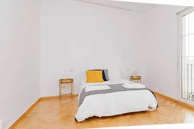 Cama o camas de una habitación en Espectacular Apto. Centro de Madrid C/Infantas 3-6 by Batuecas