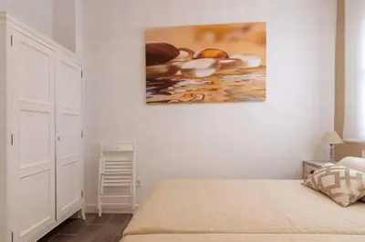 Cama o camas de una habitación en Sensacional Apartamento Junto a Palacio Real by Batuecas