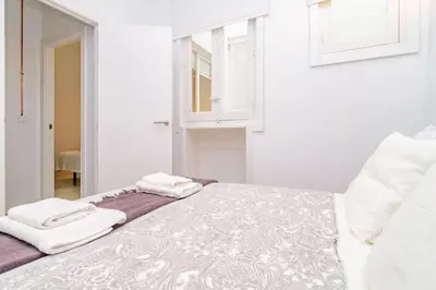 Cama o camas de una habitación en Exclusivo Apartamento en Chamberí Fernando El Católico by Batuecas