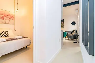 Cama o camas de una habitación en Exclusivo Apartamento en Chamberí Fernando El Católico by Batuecas