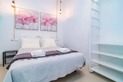 Cama o camas de una habitación en Exclusivo Apartamento en Chamberí Fernando El Católico by Batuecas