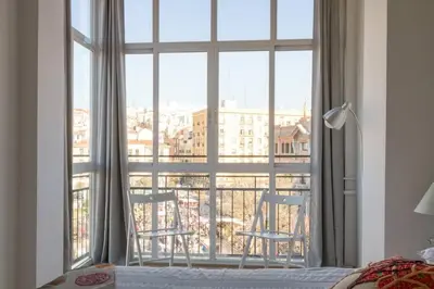 Cama o camas de una habitación en Maravilloso Apartamento en Puerta de Toledo C/Gasómetro by Batuecas