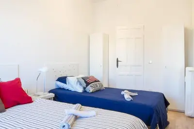 Cama o camas de una habitación en Maravilloso Apartamento en Puerta de Toledo C/Gasómetro by Batuecas