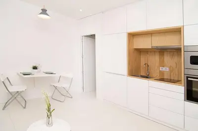 Una cocina o zona de cocina en Loft de Diseño en Pleno Centro de Madrid, Calle Torrecilla del Leal, by Batuecas