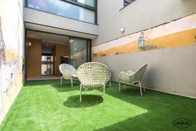 Zona de estar de Chueca Apartments - Dúplex en el Centro de Madrid