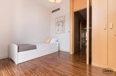 Cama o camas de una habitación en Chueca Apartments - Dúplex en el Centro de Madrid