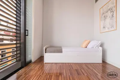 Cama o camas de una habitación en Chueca Apartments - Dúplex en el Centro de Madrid