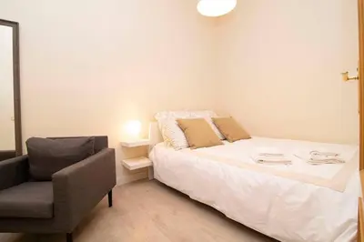 Cama o camas de una habitación en Estupendo Apartamento junto a Estación de Atocha by Batuecas