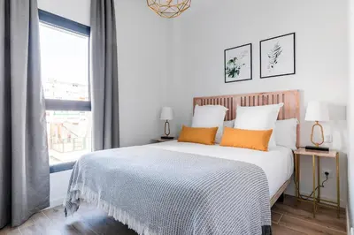 Cama o camas de una habitación en Feelathome Goya Apartments