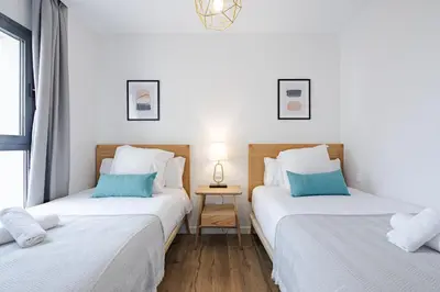 Cama o camas de una habitación en Feelathome Goya Apartments