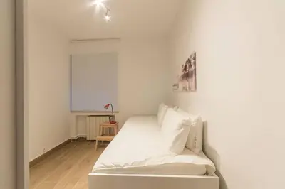 Cama o camas de una habitación en Alojamiento temporal en Malasaña
