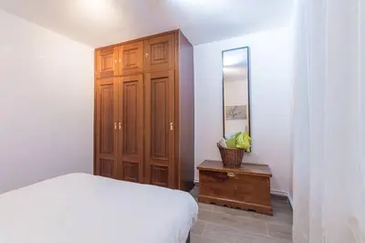 Cama o camas de una habitación en Alojamiento temporal en Malasaña