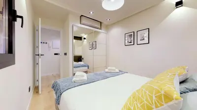 Cama o camas de una habitación en Stunning and Stylish - 1B 1BTH -Malasaña