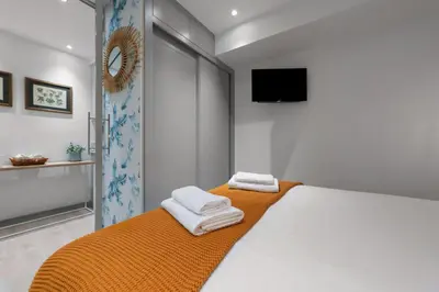 Cama o camas de una habitación en Executive Modern - 2BD 1BTH - Colon Center