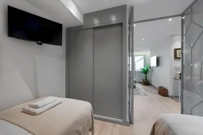 Cama o camas de una habitación en Executive Modern - 2BD 1BTH - Colon Center