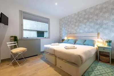 Cama o camas de una habitación en Stylish WStunning views Colon-Madrid city centre